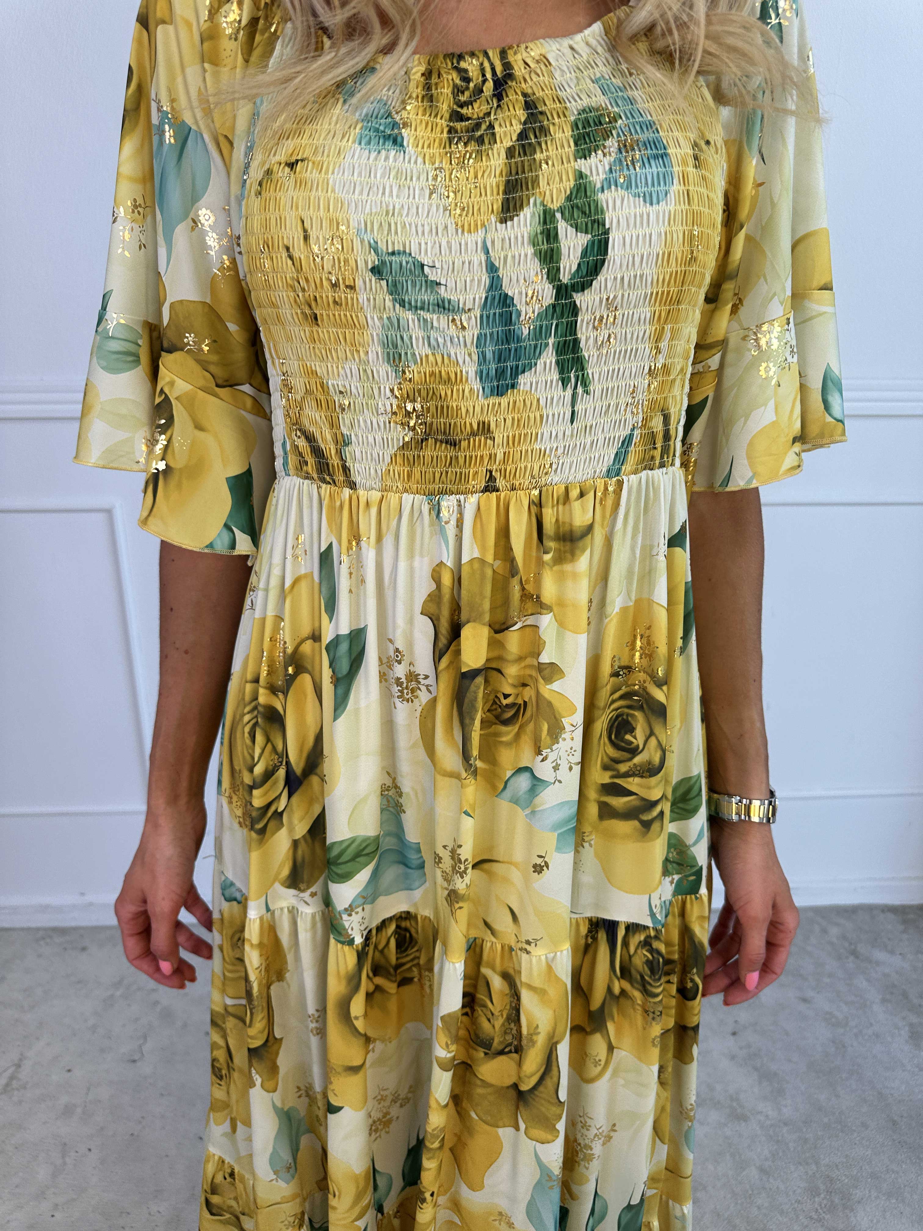 Elna Flower - Blommig elastisk klänning med resår över bysten